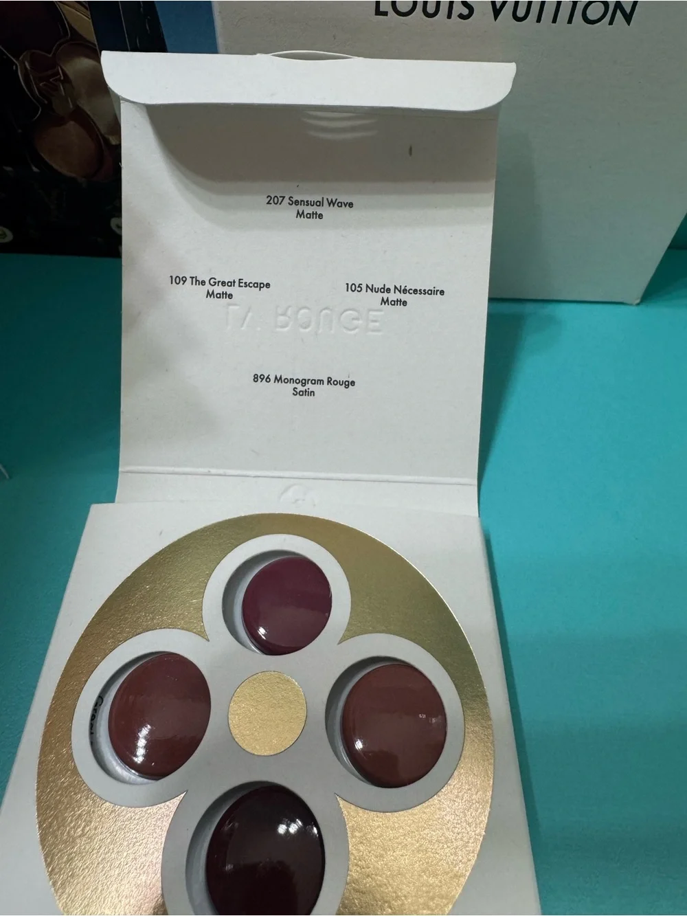 Louis Vuitton La Beauté Lip Quartet — White & Gold Packaging with Pink Tones